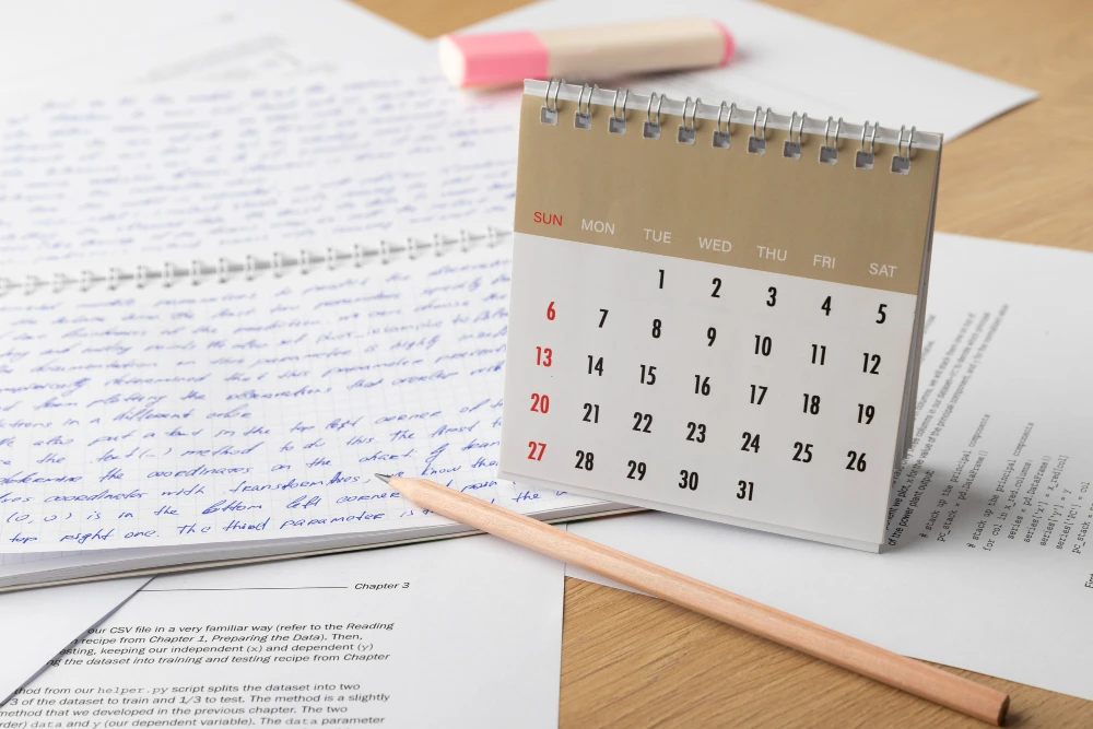 Calendario de visitas y notas manuscritas representando un acuerdo de custodia temporal en Georgia